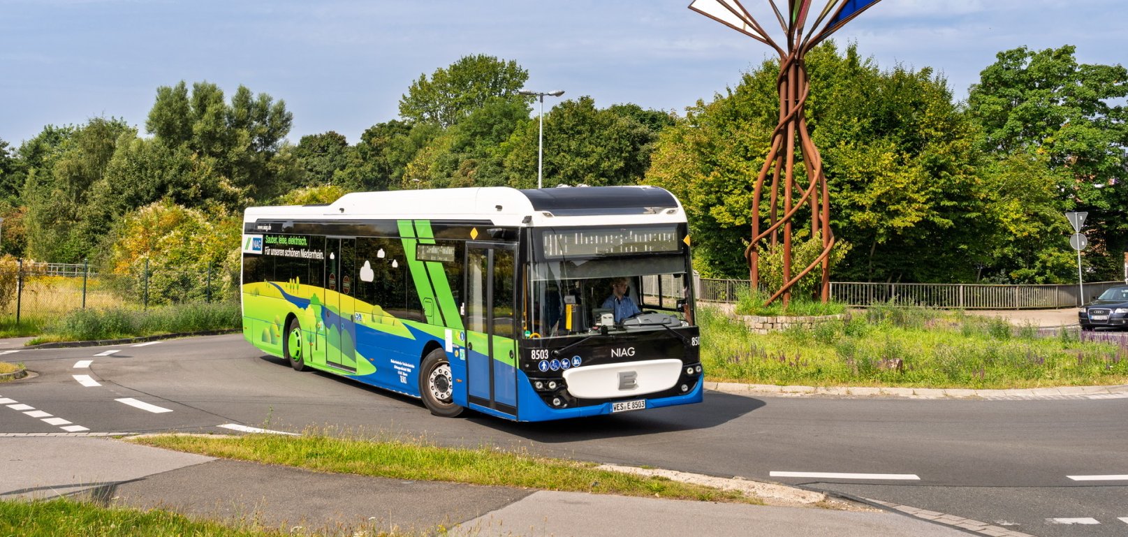 NIAG-elektrische bussen in stadsgezichten